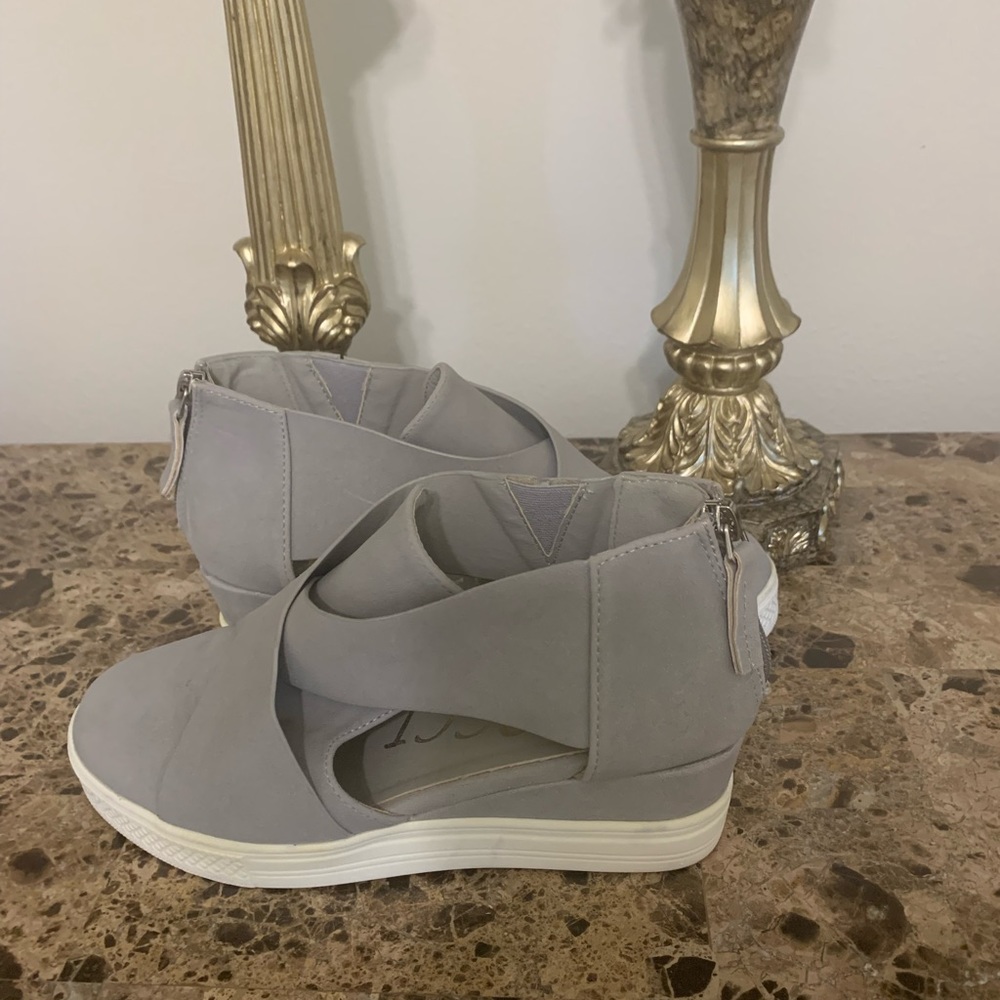 Gray CCOCCI wedges.